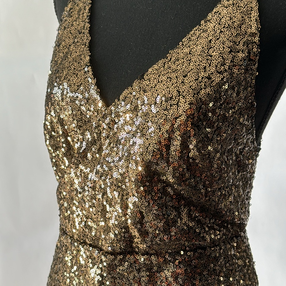 Motel Rocks Gold sequenced short romper. Bought it from Revolve.com. Never worn.